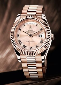 fake rolex day date in everrose gold